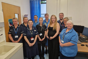 Phot of one of the first patients to receive the RSV vaccine with the WHH Maternity Vaccination Team.