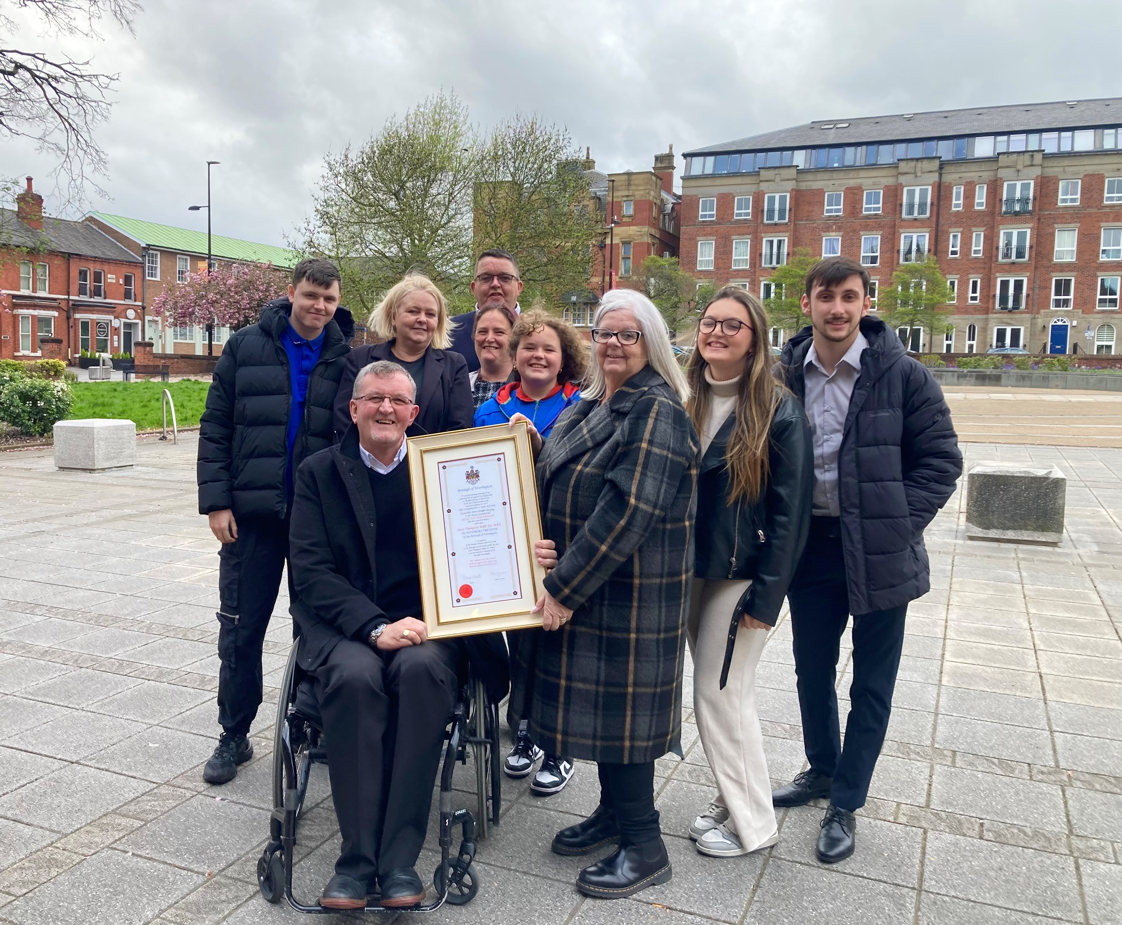 Photo of Dave Thompson, CEO, Warrington Disability Partnership with his family.