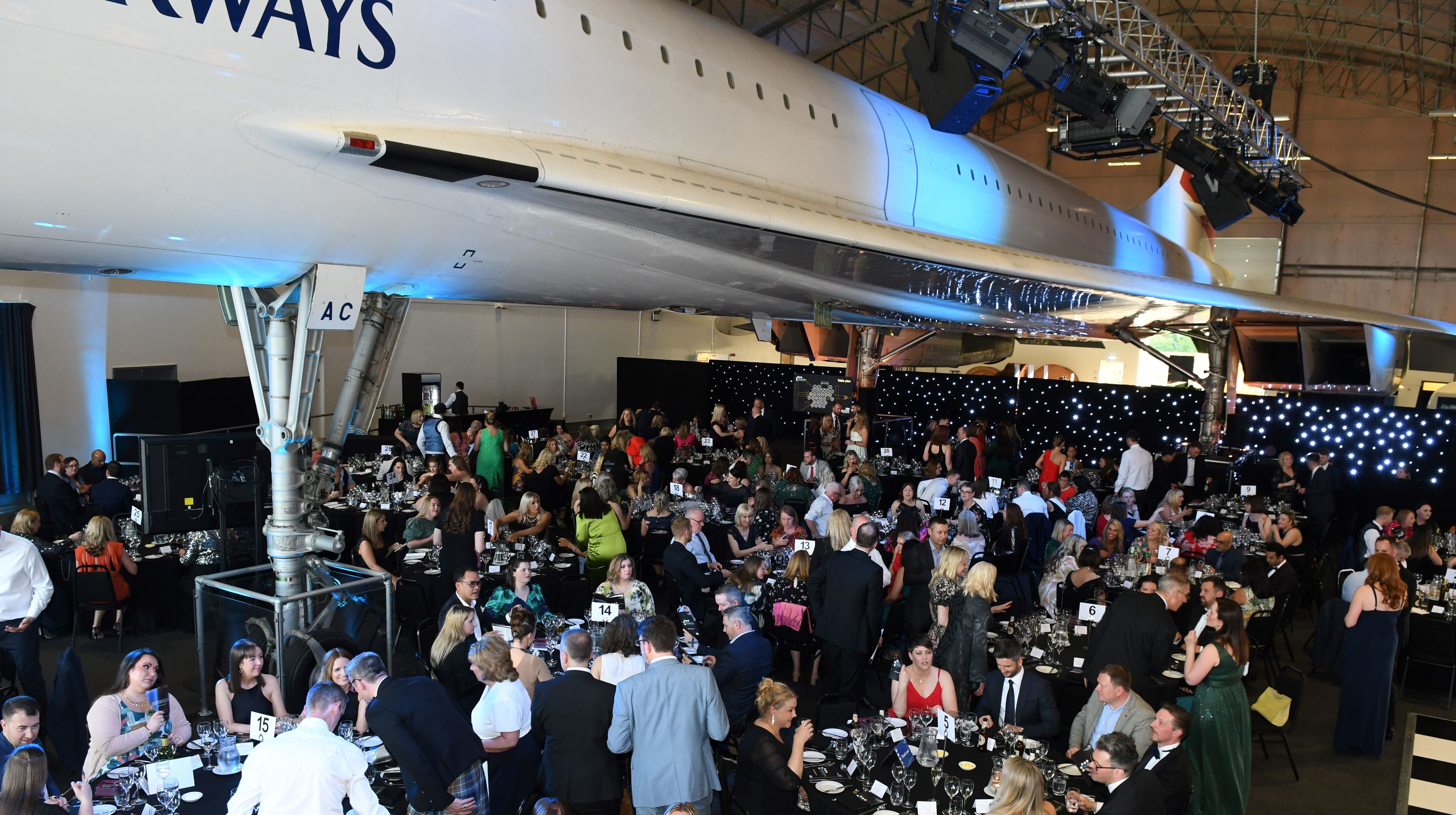 Almost 300 guests enjoyed a three-course meal under the wings of Concorde.